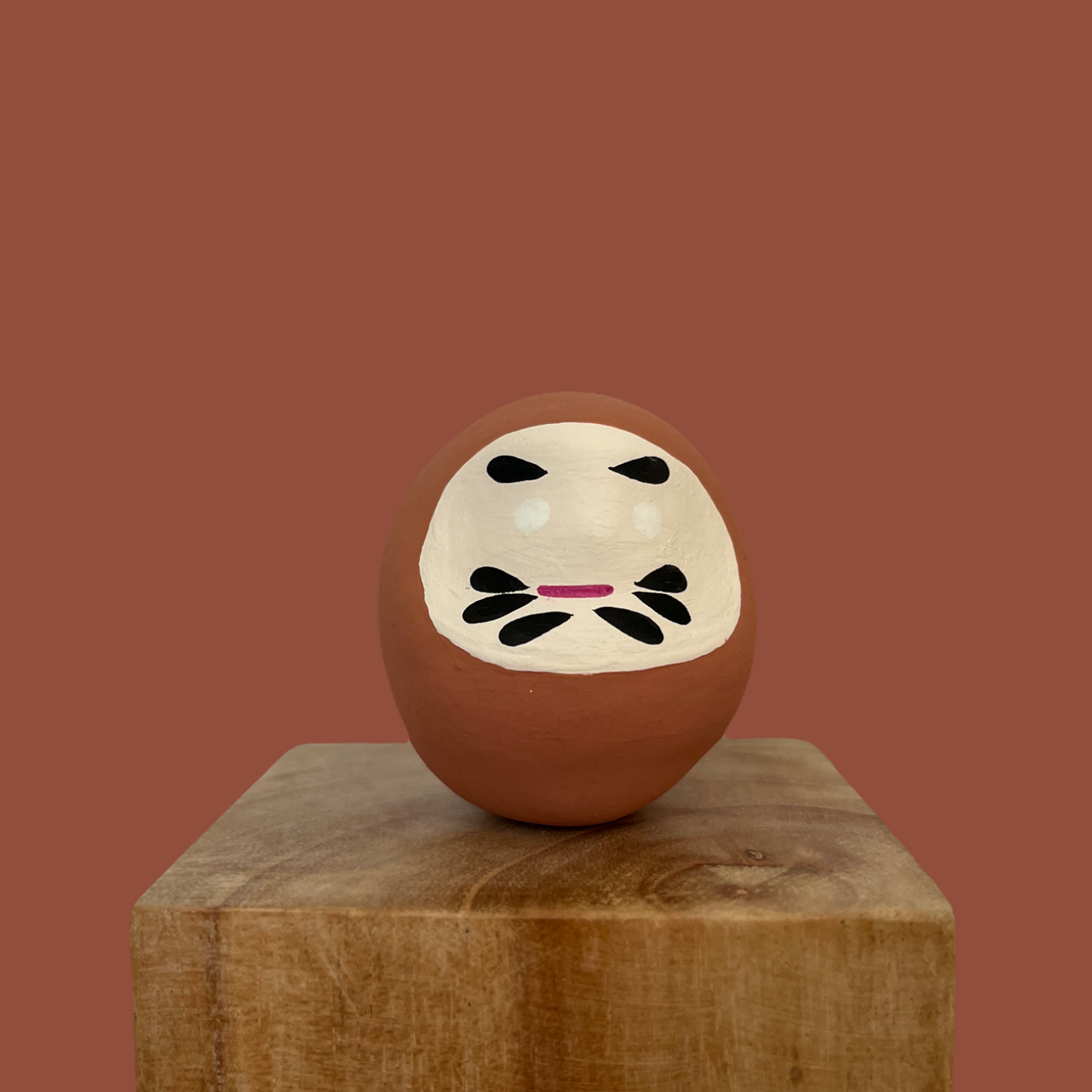 Daruma porte bonheur