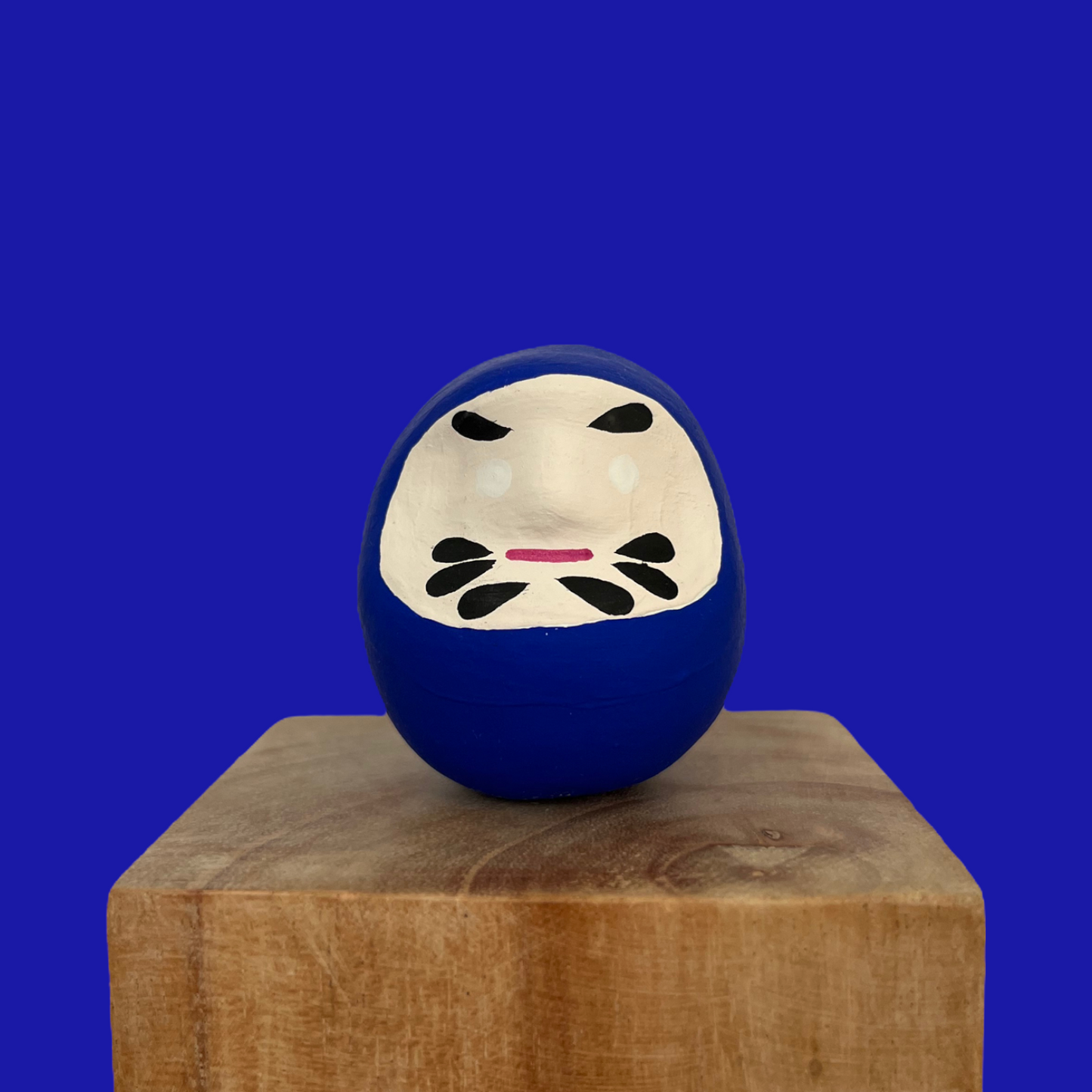 Daruma porte bonheur